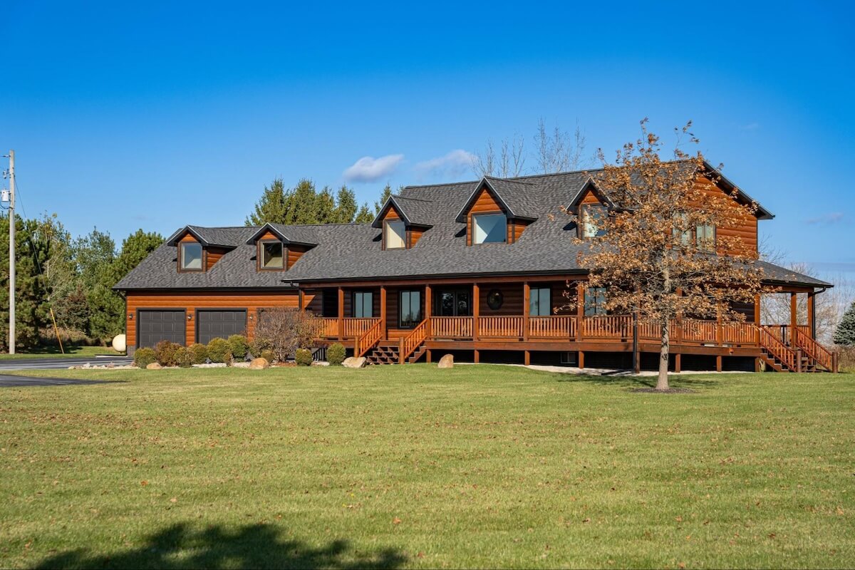 A sprawling cabin in TruLog steel log siding with a real wood look