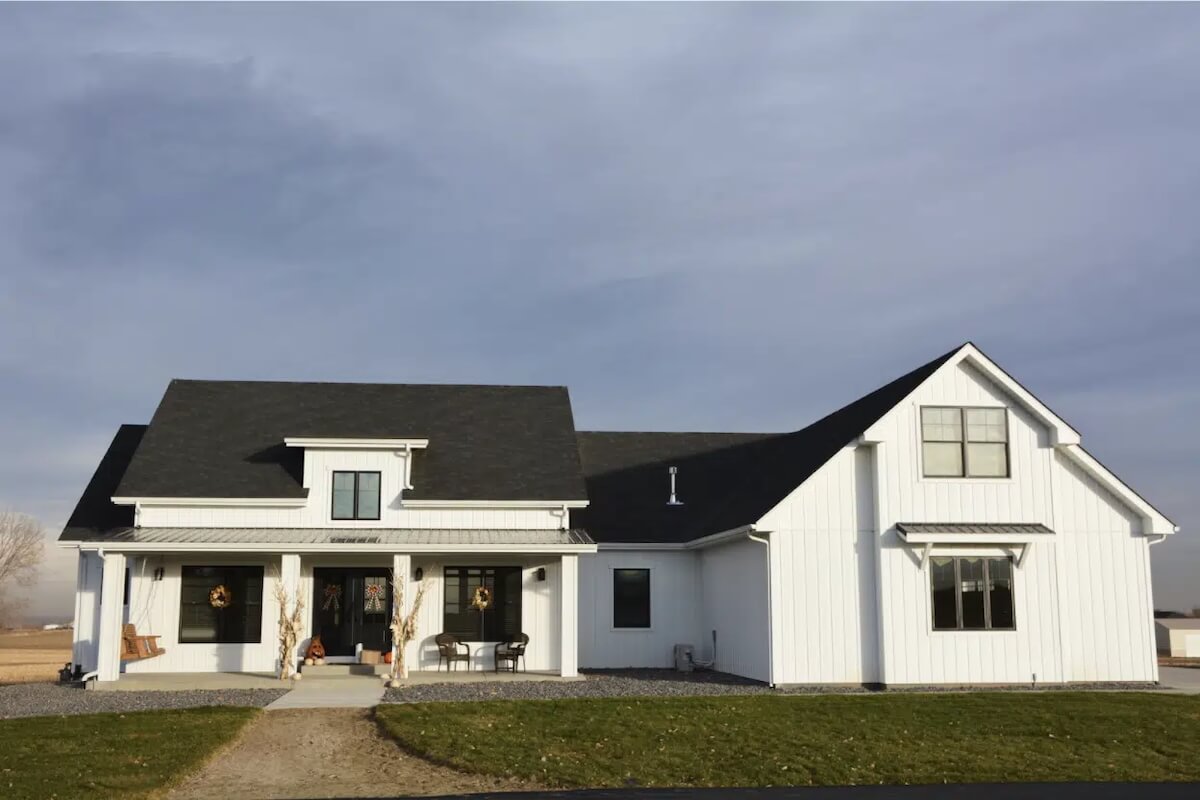 White farmhouse with board and batten siding