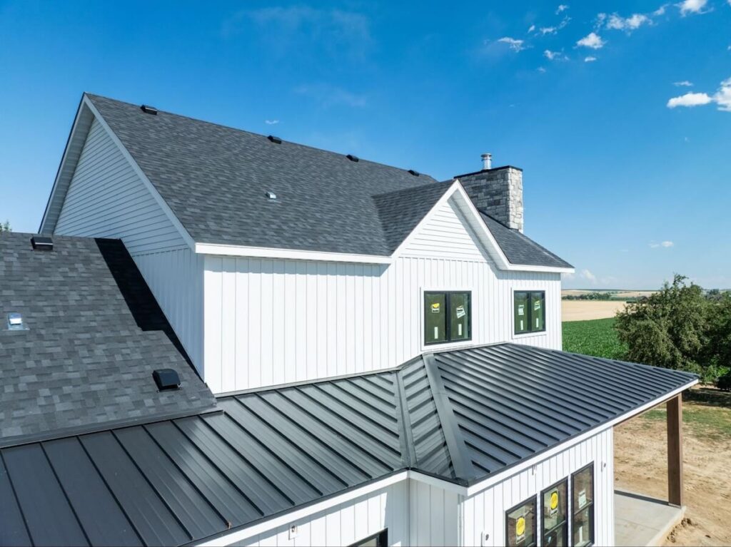 A home with a mix of TruLog steel board and batten siding and lap siding in matte white