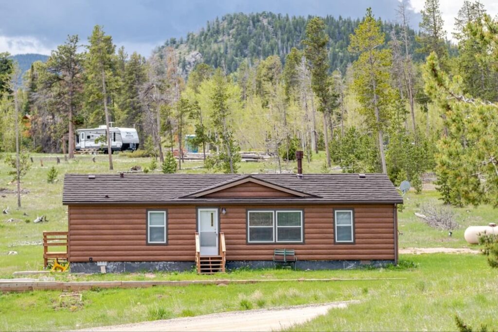 A mobile-style home with TruLog steel log siding